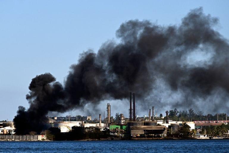 Massive Refinery Fire Deepens Cuba Fuel Crisis as Mexico Sends ‘Blockade-Defying’ Tankers Black smoke billows from a fire at the Nico Lopez oil refinery in Havana, Cuba, on Friday | AFP