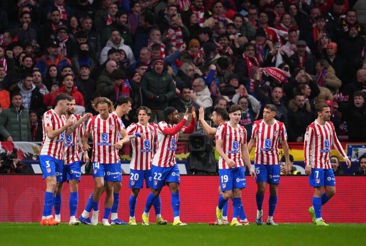 Atletico Madrid Stuns Barcelona 4-0 Ademola Lookman of Atletico de Madrid celebrates his team’s first goal with team mates, an own goal by Eric Garcia of FC Barcelona (not pictured), during the Copa Del Rey Semi-Final First Leg match between Atletico de Madrid and FC Barcelona at Riyadh Air Metropolitano on February 12, 2026 in Madrid, Spain. | Aitor Alcalde/Getty Images Getty Images