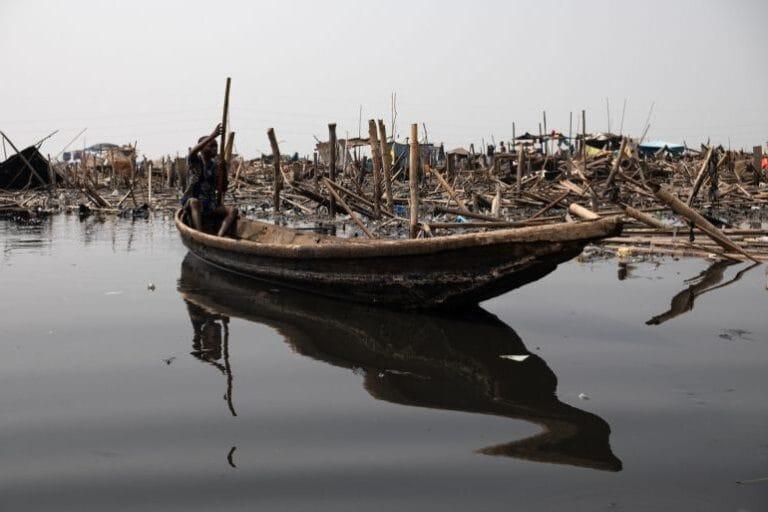 Nigeria’s Makoko Demolitions Spark Classism Debate A boy paddles past the ruins after demolitions in Makoko, Lagos, Nigeria. | Pelumi Salako/Al Jazeera