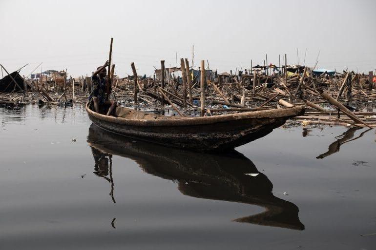 Nigeria’s Makoko Demolitions Spark Classism Debate A boy paddles past the ruins after demolitions in Makoko, Lagos, Nigeria. | Pelumi Salako/Al Jazeera