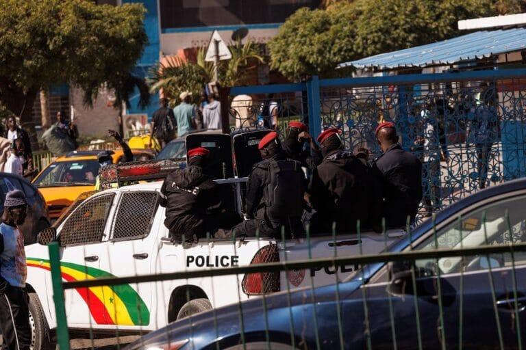 Senegal Campus Protests Leave Student Dead Amid Rising Unrest Riot police sit on their pickup truck as they drive into the Cheikh Anta Diop University campus, which was closed to students today until further notice after clashes between students and security forces left one student dead during protests over stipends and other financial support amid the government’s fiscal challenges, in Dakar, Senegal, February 10, 2026. | REUTERS/Zohra Bensemra
