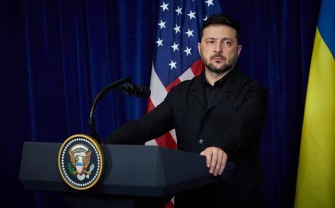 Zelensky: Elections Only After a Ceasefire and Security Guarantee Ukraine President Volodymyr Zelensky listens as Donald Trump speaks during a joint press conference at the Mar-a-Lago resort in Florida, December 28, 2025 | eaworldview
