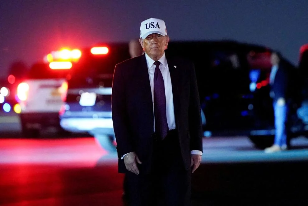 Trump: Iran Operation Will Take 4 Weeks or Less, U.S Troops Killed President Donald Trump looks on after disembarking Air Force One at Palm Beach International Airport in West Palm Beach, Florida. | Elizabeth Frantz/REUTERS