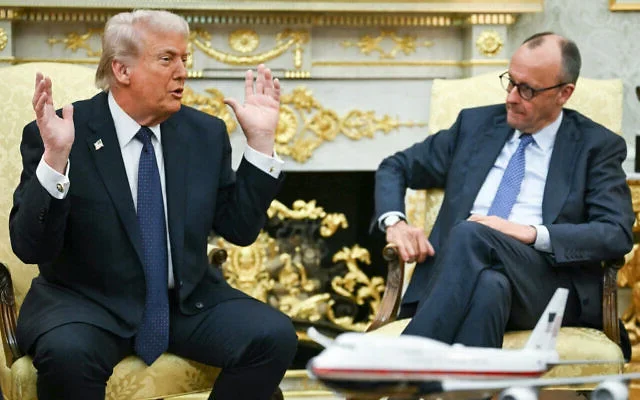 Trump threatens to cut off trade with Spain over its stance on Iran war US President Donald Trump meets with German Chancellor Friedrich Merz in the Oval Office of the White House in Washington, DC on March 3, 2026. | ANDREW CABALLERO-REYNOLDS / AFP