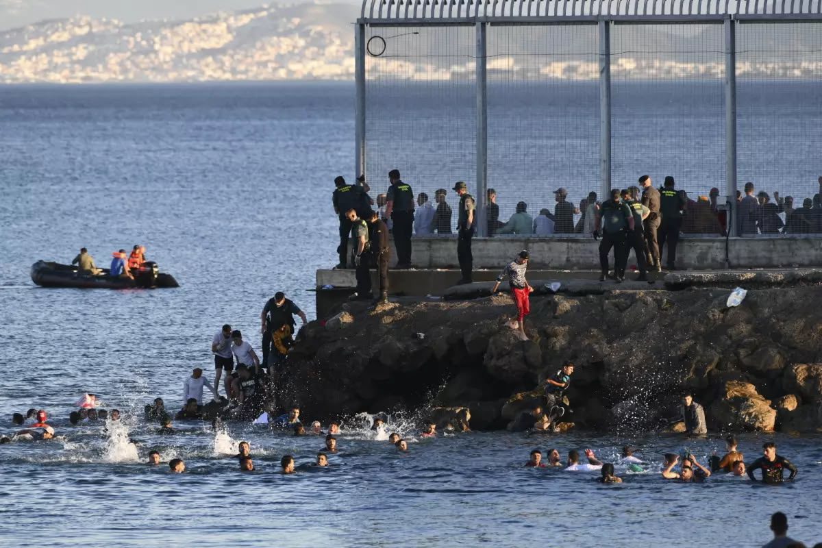 Update: Spain Deploys Military After More Than 60,000 Immigrants From Morocco Storm Border, Leaving 34 Dead Update: Spain Deploys Military After More Than 60,000 Immigrants From Morocco Storm Border, Leaving 34 Dead | Swahili Today